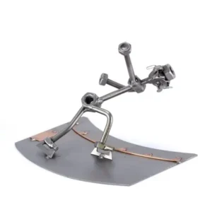 Metalen beeldje schaatser